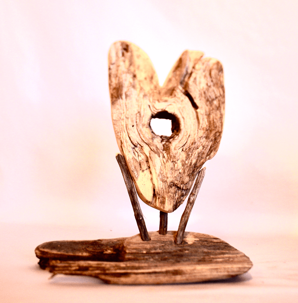 Driftwood sculpture resembling a heart shape.